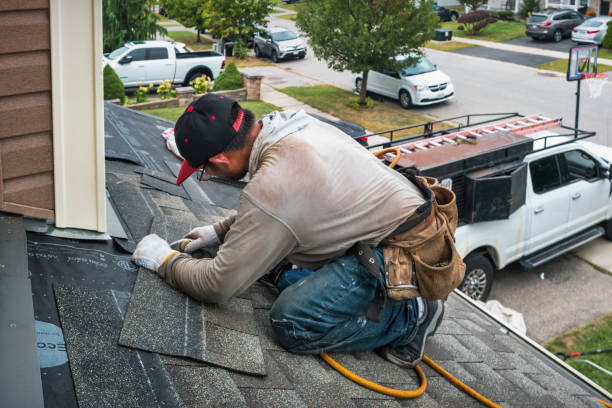 Professional Storm Damage Roof Repair technician working in North Reading, MA